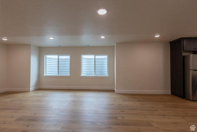 52 W 650 N Unit 3, Salem, UT 84653 - unfurnished room featuring baseboards, recessed lighting, and light wood-style flooring