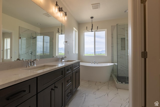 52 W 650 N Unit 3, Salem, UT 84653 - full bathroom with a marble finish shower, a freestanding tub, double vanity, and marble finish floors