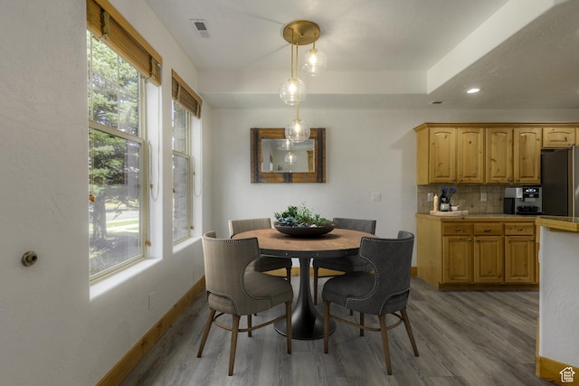 1746 W Redstone Ave # G, Park City, UT 84098 - dining space featuring hardwood / wood-style floors