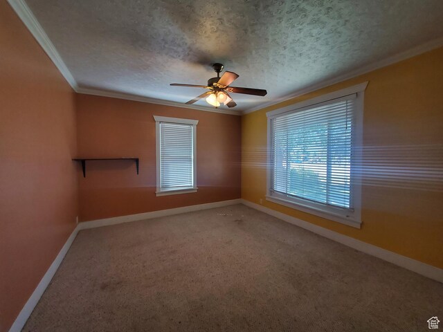 268 S 4th St, Montpelier, ID 83254 - carpeted empty room with ornamental molding, baseboards, ceiling fan, and a textured ceiling