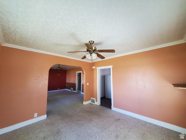 268 S 4th St, Montpelier, ID 83254 - carpeted spare room with arched walkways, ceiling fan, baseboards, and ornamental molding