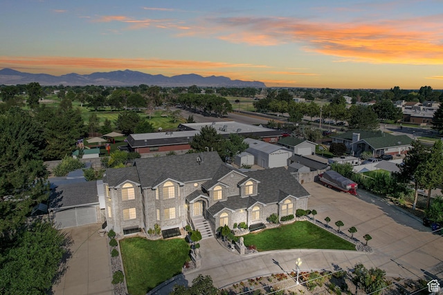 aerial view at dusk with a mountain view