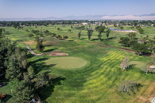 aerial view featuring a mountain view and view of golf course