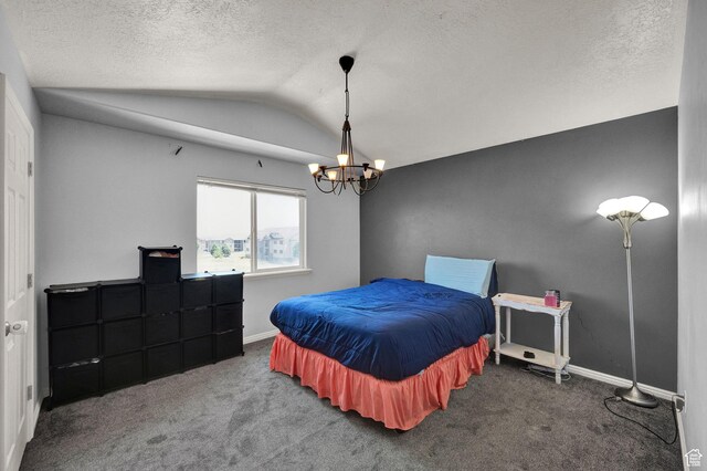 8246 N Cedar Springs Rd Unit 11, Eagle Mountain, UT 84005 - bedroom featuring a notable chandelier, baseboards, vaulted ceiling, carpet flooring, and a textured ceiling