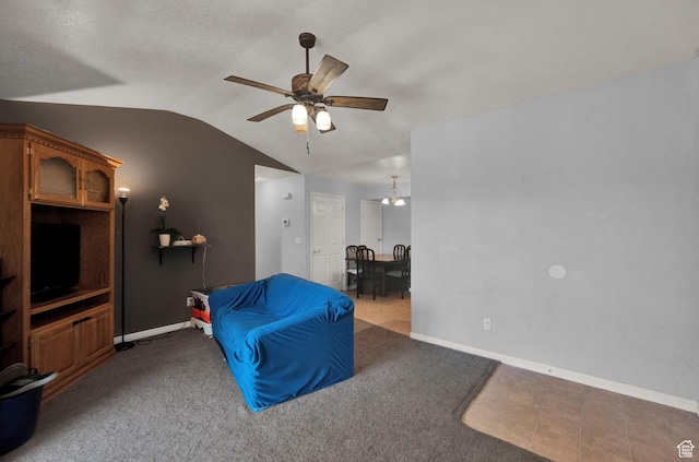 8246 N Cedar Springs Rd Unit 11, Eagle Mountain, UT 84005 - living area with carpet flooring, baseboards, ceiling fan, and vaulted ceiling
