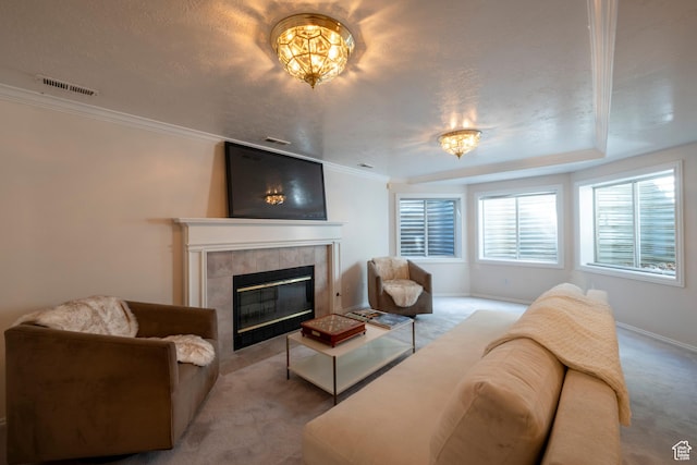 3880 E Thousand Oaks Cir, Salt Lake City, UT 84124 - living area featuring visible vents, ornamental molding, a tiled fireplace, carpet flooring, and baseboards