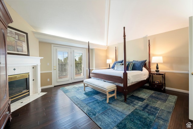 3880 E Thousand Oaks Cir, Salt Lake City, UT 84124 - bedroom with wood finished floors, baseboards, a fireplace, vaulted ceiling, and access to outside