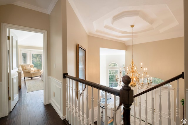 3880 E Thousand Oaks Cir, Salt Lake City, UT 84124 - hall featuring dark wood-type flooring, wainscoting, crown molding, a decorative wall, and a notable chandelier