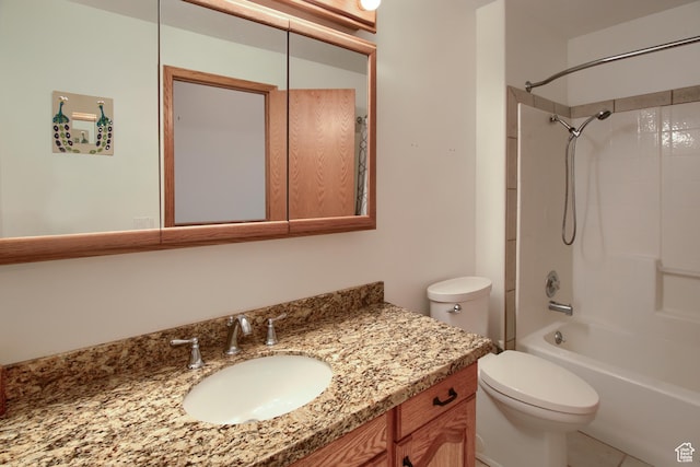 full bathroom featuring toilet, vanity, and washtub / shower combination