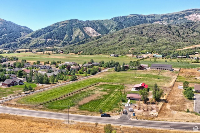 aerial view with a mountain view and a rural view