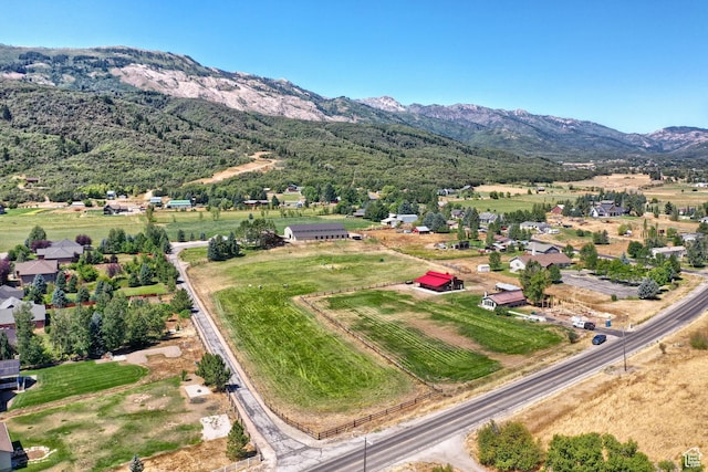 aerial view with a mountain view and a rural view
