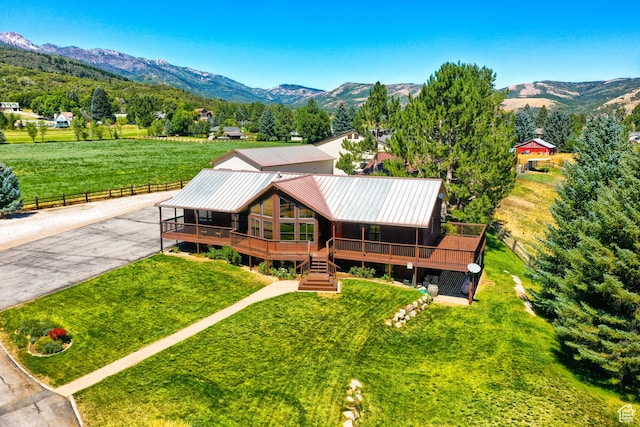 drone / aerial view featuring a mountain view