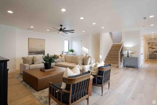 5346 Cyan Ln, St George, UT 84790 - living area featuring baseboards, light wood-style flooring, ceiling fan, stairway, and recessed lighting