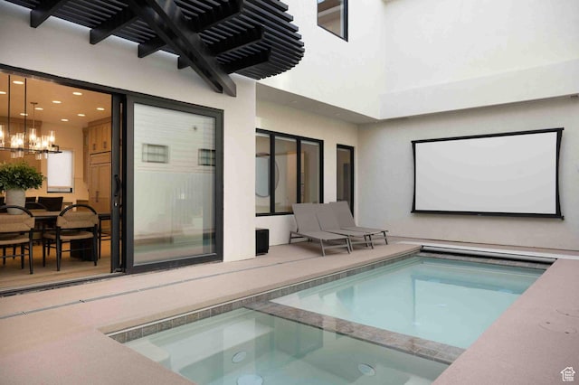 5346 Cyan Ln, St George, UT 84790 - view of pool featuring an inviting chandelier and a pool with connected hot tub