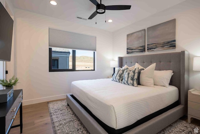5346 Cyan Ln, St George, UT 84790 - bedroom featuring recessed lighting, wood finished floors, visible vents, and baseboards