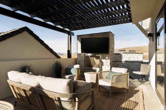 5346 Cyan Ln, St George, UT 84790 - exterior space with an outdoor living space with a fireplace and a pergola