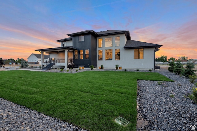 165 S Farmhouse Cir, Kaysville, UT 84037 - back of house at dusk with a lawn