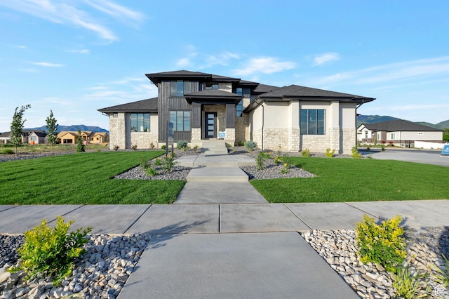 165 S Farmhouse Cir, Kaysville, UT 84037 - prairie-style house featuring stone siding, a front lawn, and stucco siding