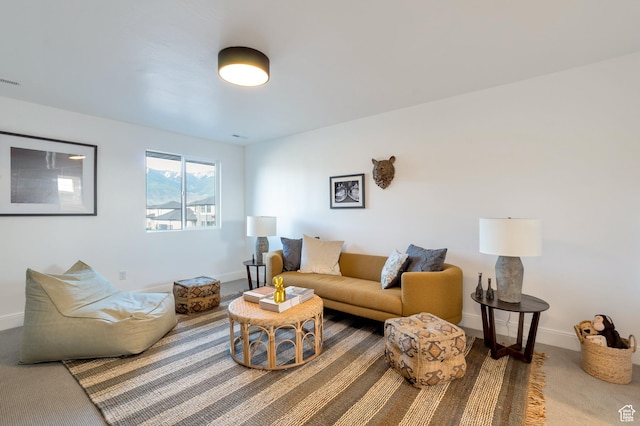 165 S Farmhouse Cir, Kaysville, UT 84037 - living area with carpet floors, visible vents, and baseboards