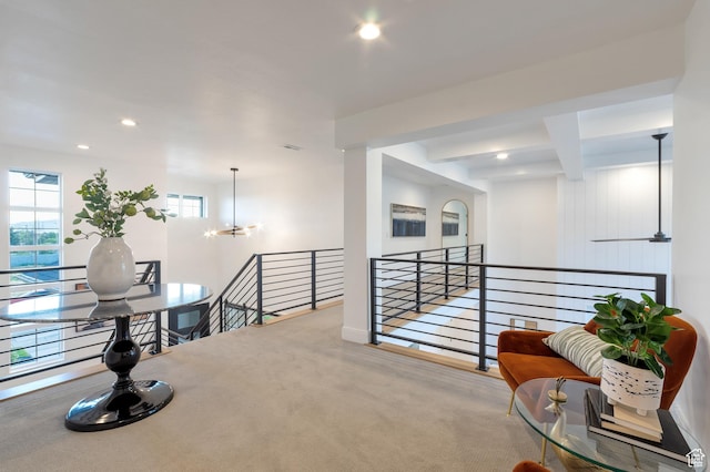 165 S Farmhouse Cir, Kaysville, UT 84037 - hallway with carpet, an upstairs landing, a chandelier, beam ceiling, and recessed lighting