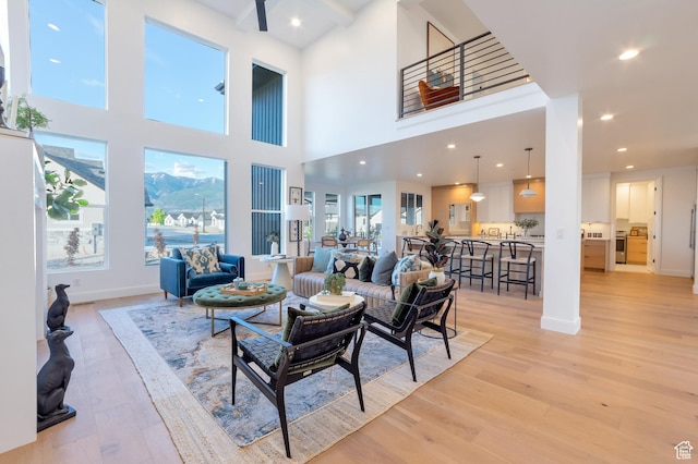 165 S Farmhouse Cir, Kaysville, UT 84037 - living area featuring recessed lighting, light wood-style flooring, and baseboards