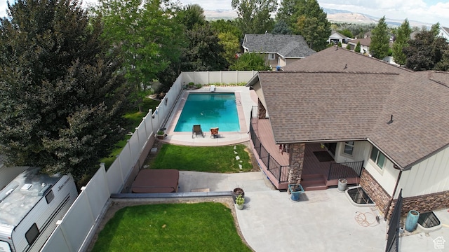 880 E 300 S, Smithfield, UT 84335 - view of swimming pool featuring a patio, a fenced backyard, a fenced in pool, a lawn, and a diving board
