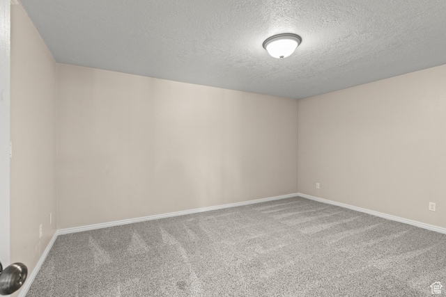880 E 300 S, Smithfield, UT 84335 - carpeted spare room featuring baseboards and a textured ceiling