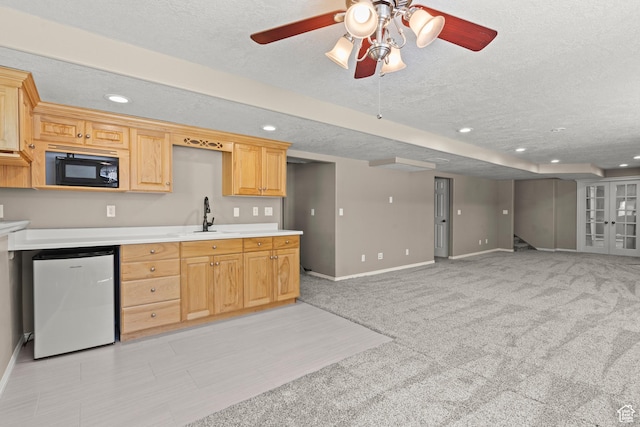 880 E 300 S, Smithfield, UT 84335 - kitchen with baseboards, a textured ceiling, black microwave, and refrigerator