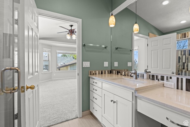 880 E 300 S, Smithfield, UT 84335 - bathroom with vanity, ceiling fan, vaulted ceiling, and a wealth of natural light