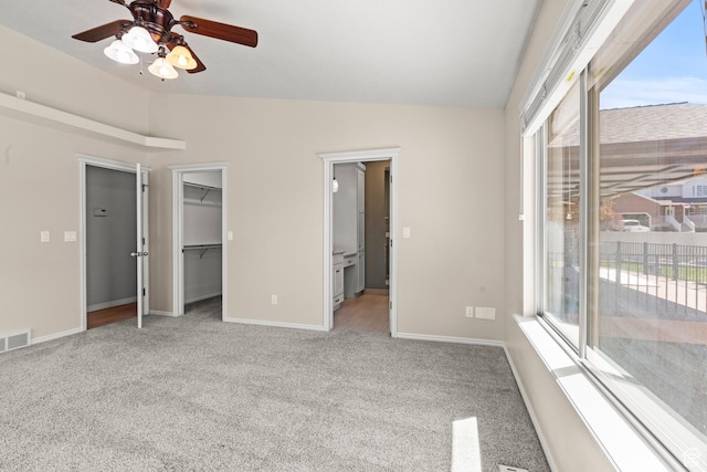 880 E 300 S, Smithfield, UT 84335 - unfurnished bedroom featuring visible vents, baseboards, lofted ceiling, access to outside, and carpet flooring