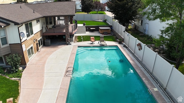 880 E 300 S, Smithfield, UT 84335 - view of pool featuring a wooden deck, a fenced backyard, a fenced in pool, central air condition unit, and a patio
