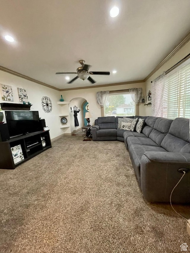 221 N 100 E, Price, UT 84501 - carpeted living area with crown molding, arched walkways, a ceiling fan, recessed lighting, and baseboards