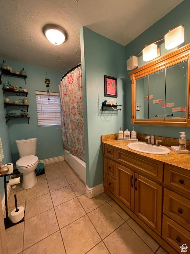 221 N 100 E, Price, UT 84501 - full bathroom with toilet, vanity, baseboards, tile patterned flooring, and a textured ceiling
