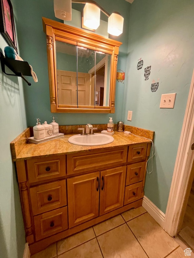 221 N 100 E, Price, UT 84501 - bathroom with vanity, tile patterned floors, and baseboards