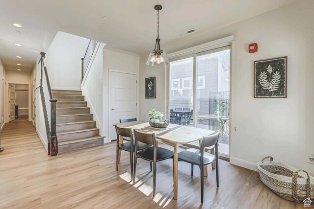 1240 E Villa Way Unit 64, Washington, UT 84780 - dining room featuring light wood finished floors, stairway, a wealth of natural light, and recessed lighting
