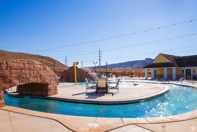 1240 E Villa Way Unit 64, Washington, UT 84780 - pool with a patio, fence, and a mountain view