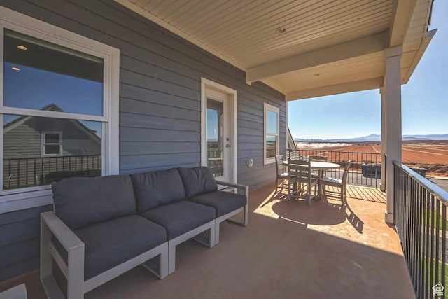 1240 E Villa Way Unit 64, Washington, UT 84780 - view of patio featuring an outdoor hangout area, a mountain view, and a balcony