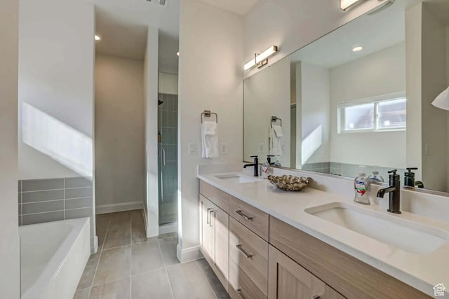 1240 E Villa Way Unit 64, Washington, UT 84780 - bathroom featuring double vanity, a garden tub, a sink, and tile patterned floors