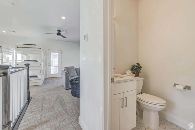 1240 E Villa Way Unit 64, Washington, UT 84780 - bathroom featuring baseboards, a ceiling fan, toilet, vanity, and recessed lighting