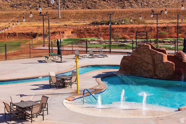 1240 E Villa Way Unit 64, Washington, UT 84780 - community pool featuring a patio area and fence