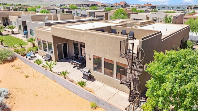 3193 S 4900 W, Hurricane, UT 84737 - rear view of property featuring a patio area, fence, and stucco siding