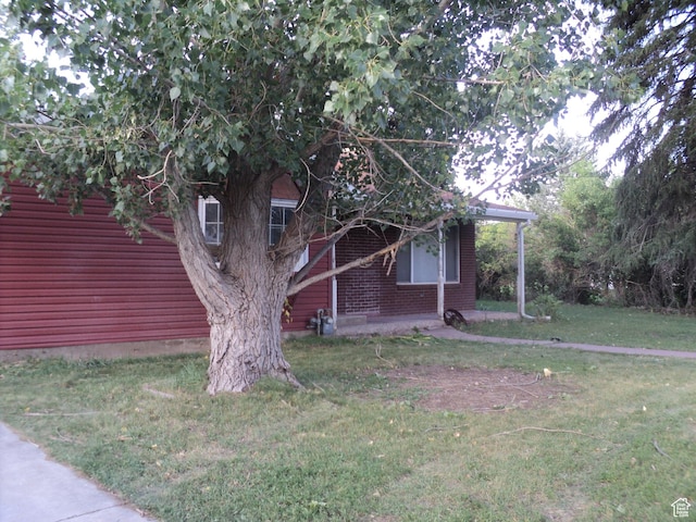 50 W 250 N, Midway, UT 84049 - view of front of home featuring brick siding and a front yard