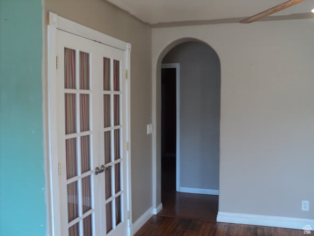 50 W 250 N, Midway, UT 84049 - spare room featuring arched walkways, french doors, dark wood-style floors, and baseboards