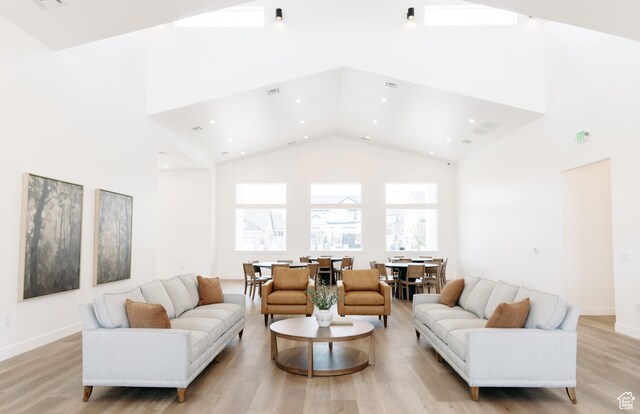 4715 W Dearing Ln Unit Ll303, Riverton, UT 84096 - living room featuring light hardwood / wood-style floors and high vaulted ceiling