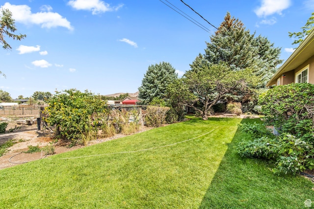 view of yard with fence