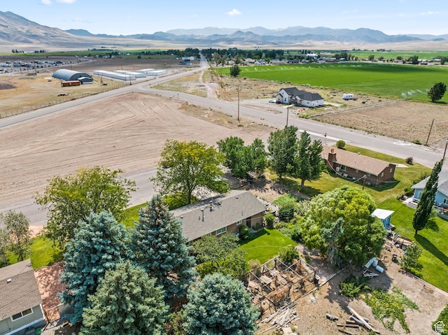 aerial view featuring a rural view and a mountain view