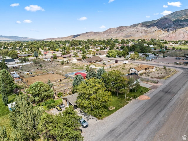 drone / aerial view featuring a mountain view