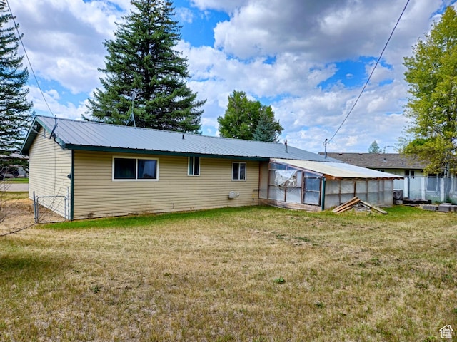 674 N 6th St, Montpelier, ID 83254 - back of property with a lawn