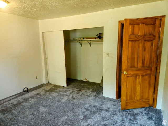 674 N 6th St, Montpelier, ID 83254 - unfurnished bedroom with a textured ceiling, carpet, and a closet