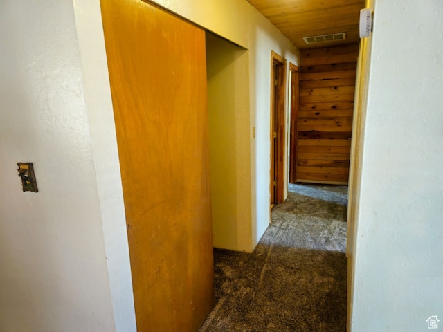 674 N 6th St, Montpelier, ID 83254 - hallway featuring wood ceiling and carpet floors